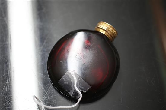 A 19ct century gold topped moon shaped ruby glass scent bottle, 3.25in.